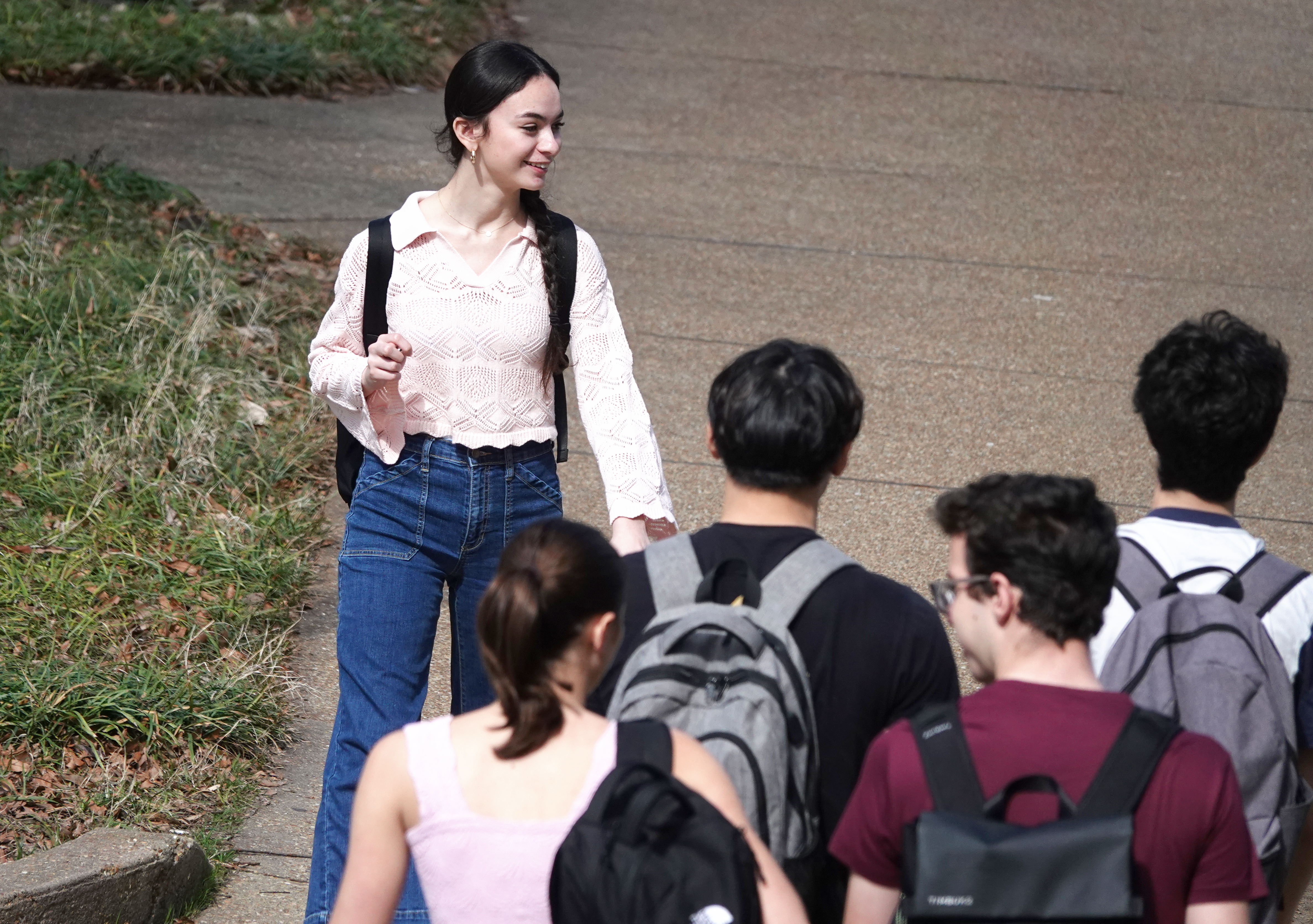 Students greeting each other on campus